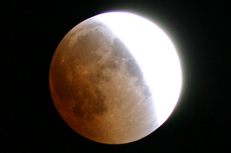 Photo of a lunar eclipse in progress, taken at the Leitner Family Observatory in 2004. (Courtesy of Michael Faison)