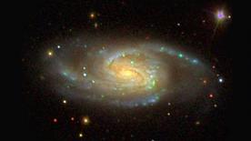 A three-color optical image of a Milky Way sibling. (Courtesy of Sloan Digital Sky Survey)